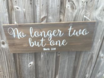 rustic wooden wall sign featuring the bible verse "No longer two but one Mark 10:8