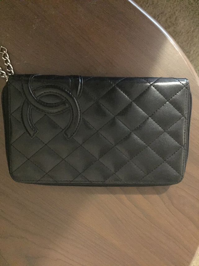 Black and pink Chanel wallet