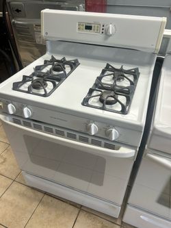 White fridge and gas stove