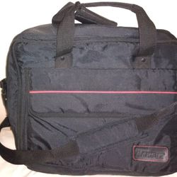 Various laptop cases, backpacks, duffle bags, rolling luggage, totes.