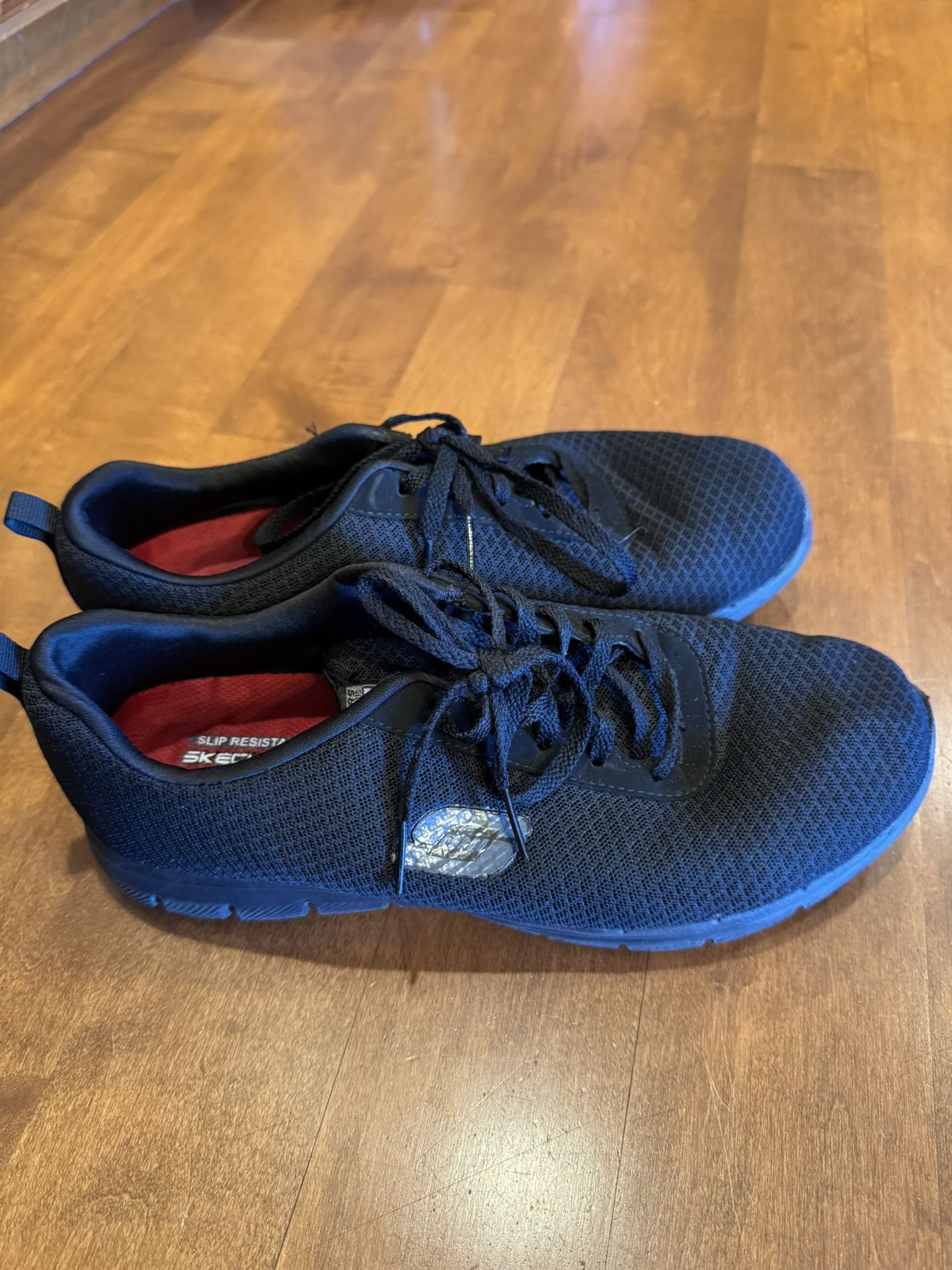 Woman’s Skechers slip resistant sneakers shipping available