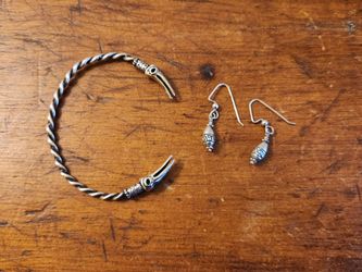 Silver bracelet and earrings by Michael Hayman