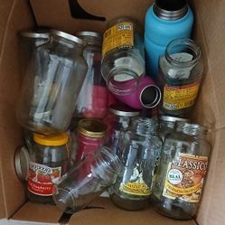 Box Of Cups And Glass Jars With Lids
