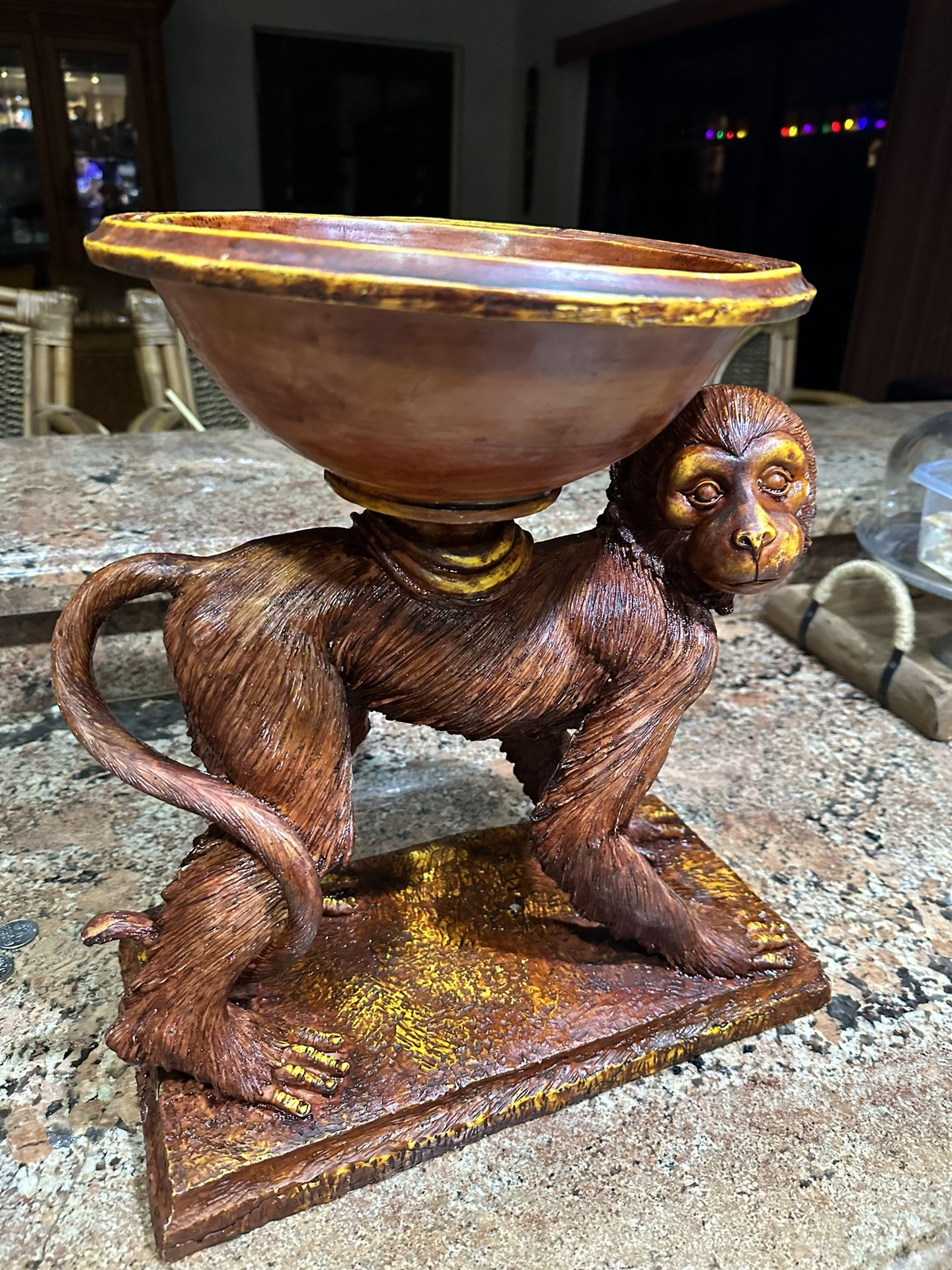 Monkey Holding Bowl