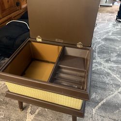 Wicker table with compartments inside
