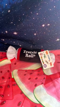Tootsie roll stuffie with tag