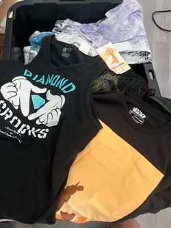Today: Massive Garage Sale — 1,000 items for $1 each! New T-shirts, clothing, sunglasses, jeans, baby items, glassware, posters, toys, and much more.