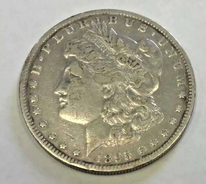 1895-O MORGAN SILVER DOLLAR