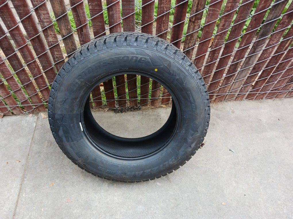 Bridgestone Blizzak Brand New 17 Inch Tire 245/65/17 for Sale in