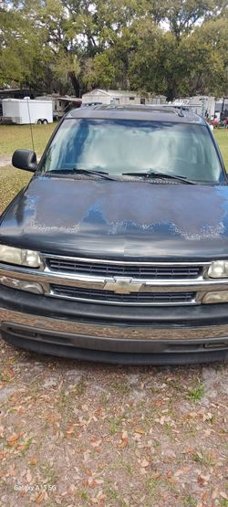 2005 Chevrolet Suburban 1500  and a 2007 Dodge Caliber  stx