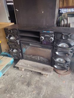 Technical Pro XFIRE Fireplace Entertainment Center featuring an integrated 10,000-watt peak Bluetooth