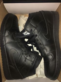 High top black Jordan 1’s