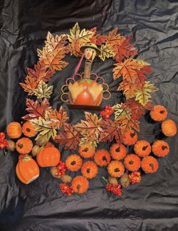 Fall decorations including Metal Wreath,  Metal Turkey, salt and pepper shakers and pumpkins $12