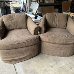 2 Fabric Covered Swivel Chairs