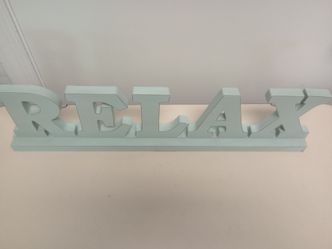 Wooden relax sign