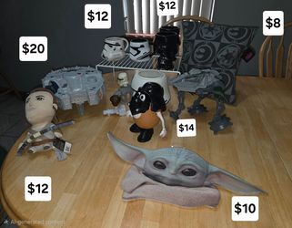 Star Wars collectables: Stormtrooper AT-AT Walker wind-up bobble-head toy $8, Princess Leia toy $8, Darth vader potato head $14, Rey talking Plush S