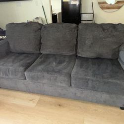 DARK GRAY PULL OUT BED WITH PLASTIC STILL ON BED !  COUCH & SOFA SET