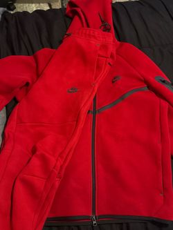 Red Nike tech suit