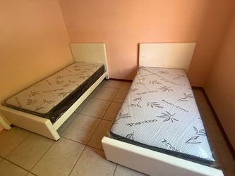 2 Twin size bed frame with 2 mattress and free delivery free installation all new furniture