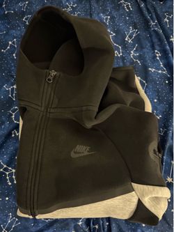 Black and grey mens Nike tech fleece zip-up