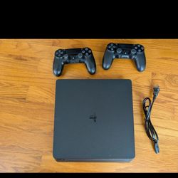 Sony PlayStation 4 PS4 Slim 1TB Console - w/2 controllers and cord. tested 