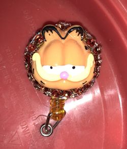 Retractable badge reel