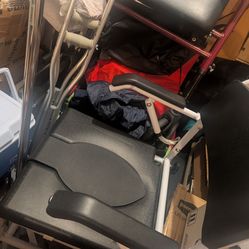 Rolling shower/commode chair