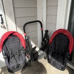 Double Stroller With Red Canopy 