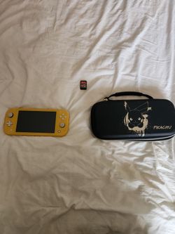 (Lightly Used) Nintendo Switch Lite With Case And Mario cart  Deluxe