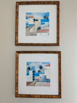 E. Milan "Casa I" and "Casa II" bronzed gold framed lithograph art prints.