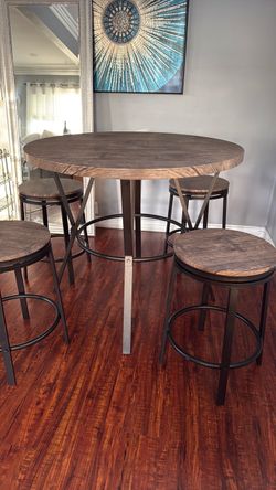 Dining table with 4 swivel chairs