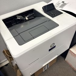 HP M506