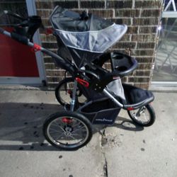 Three-wheel Baby Stroller For Jogging Or Just Regular Use With Pneumatic Tires Made By Baby Trend
