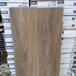 Style Selections Brunette Oak Waterproof Vinyl Plank Flooring