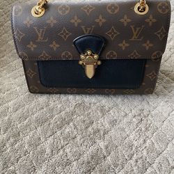 Louis Vuitton Victorie Bag