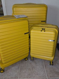 3-Piece Triplus Yellow Hardshell Spinner Luggage Set w/ TSA Locks – $100