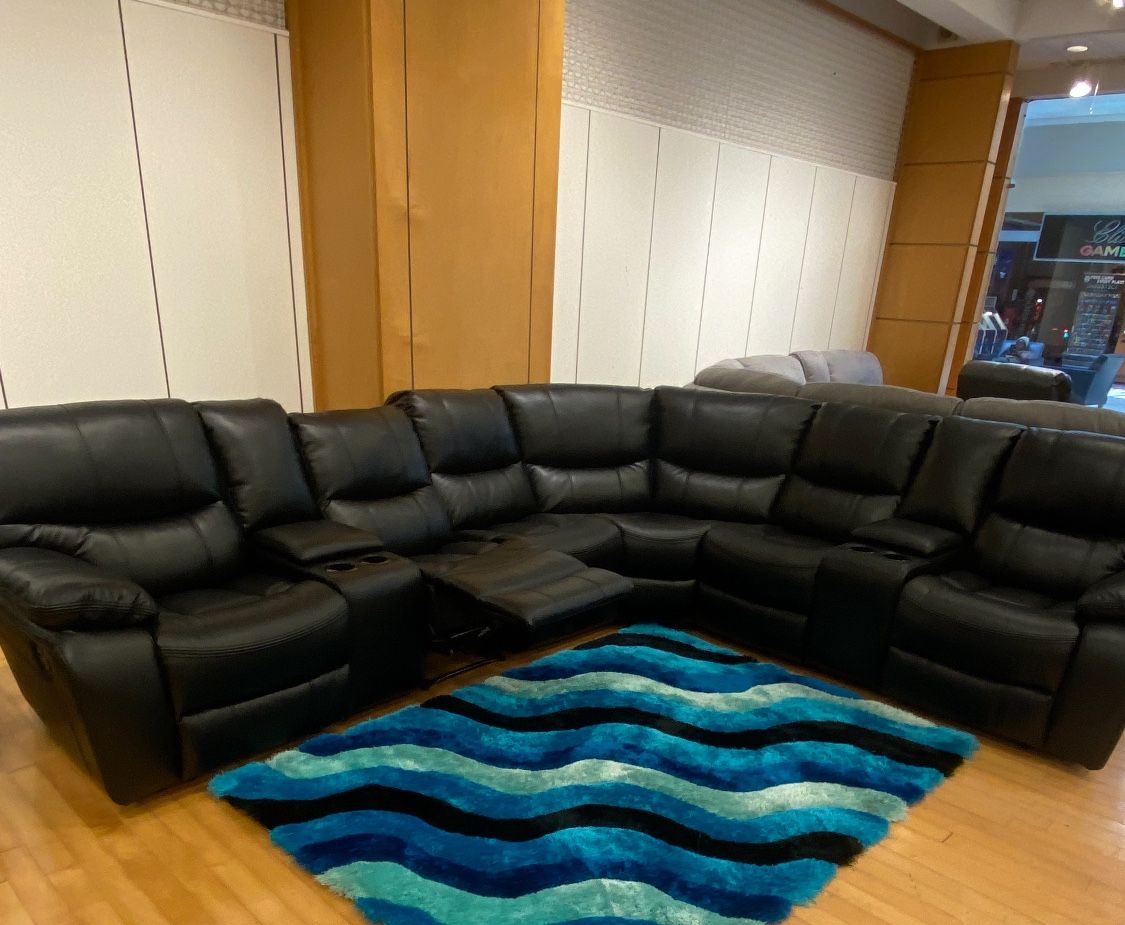 For clearance sale. Madrid black leather reclining sectional now $1599. Easy finance option. Same day delivery.