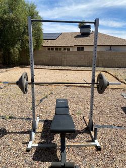 Adjustable Bench Press / Squat Rack/Pull-Up Bar with Weight Plates