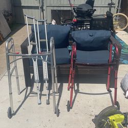 2 Walkers And Set Of Crutches 