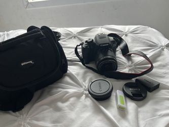 Camara Canon 2000D