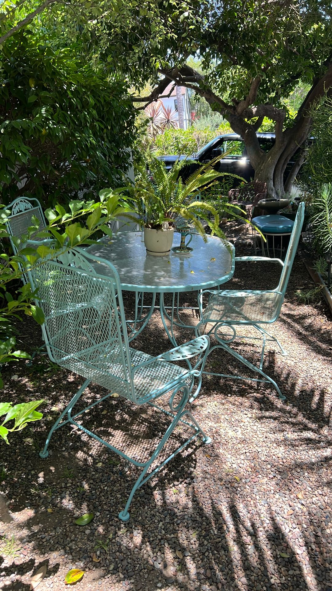 Table And 4 Rocking Wrought Iron Chairs