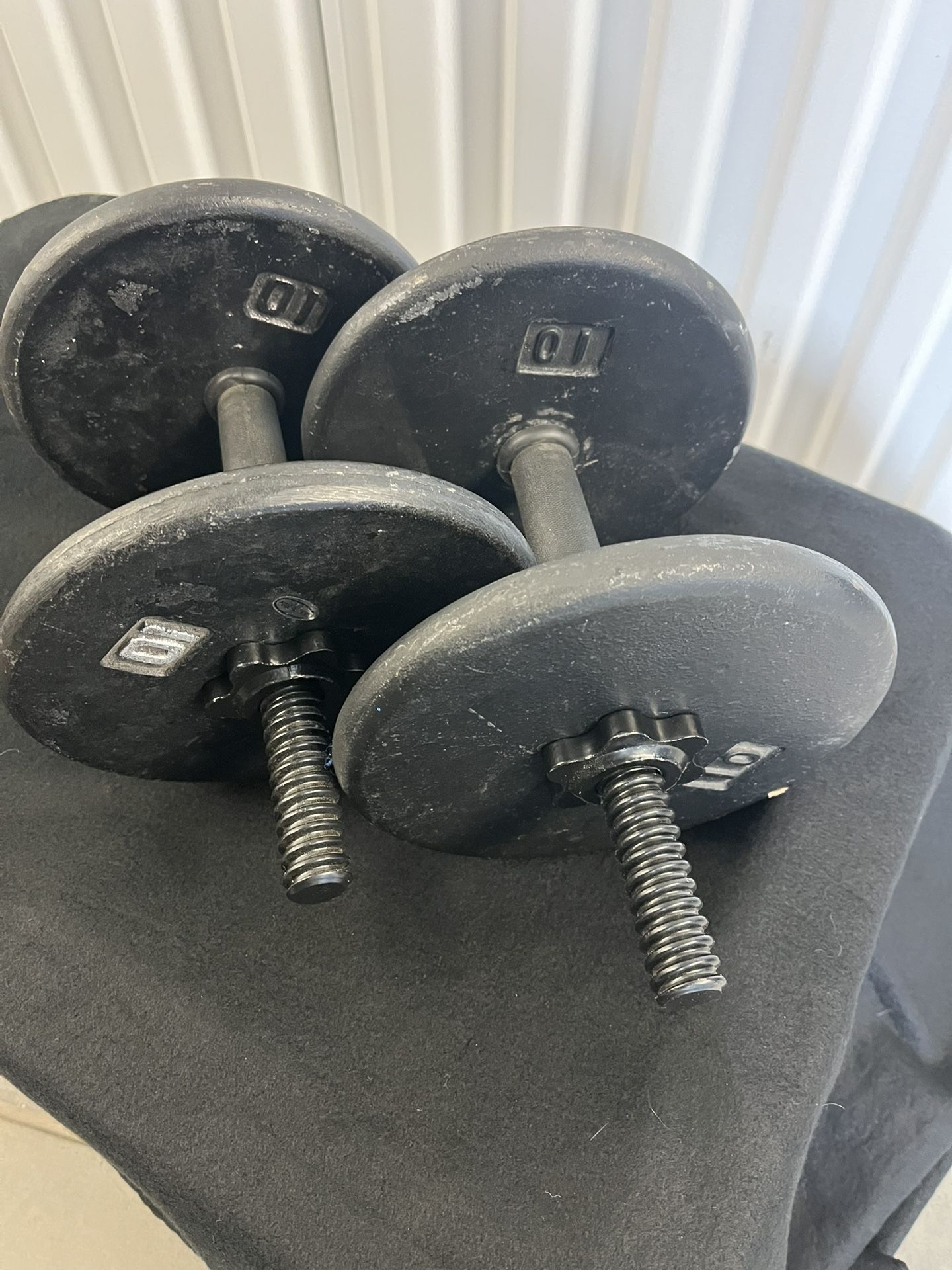 Dumbbells, (4)- 10lbs Plates & Set of 1” threaded adjustable dumbbell padded handles