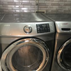 Very  Nice Electric stainless steel washer and dryer