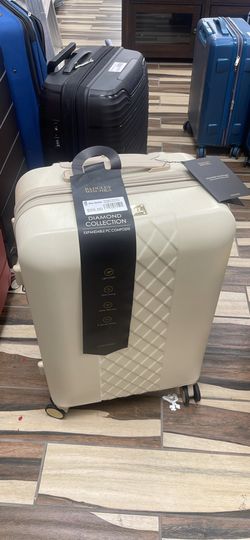 BADGLEY MISCHKA expandable luggage (checked bag size)