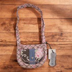 Vintage couture cloth crossbody 
front flip snap enclosure pocket.
interior has two slip pockets.
