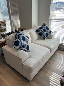 Cream sofa from Rooms To Go