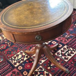 Round antique accent table
