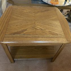 Solid oak end table  21 By 27