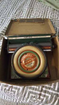 Amazing Type writer Tin