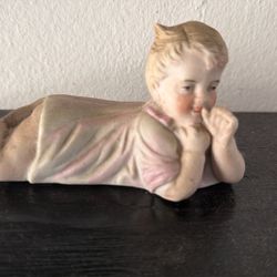 Antique German Bisque Baby Girl Laying Piano Baby Figurine Sculpture